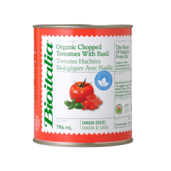 Chopped tomatoes with tomato juice and basil