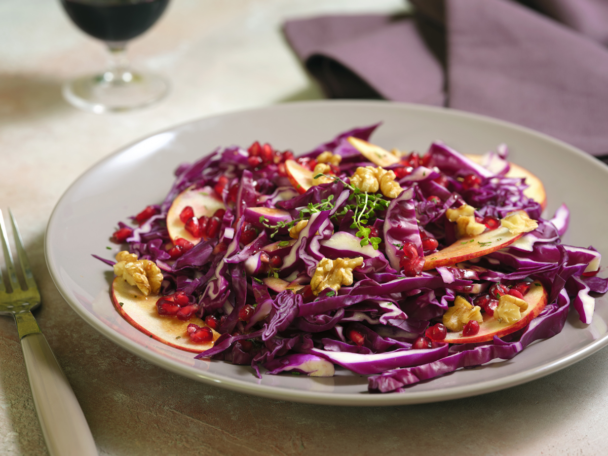 Red cabbage, apple, pomegranate and walnut salad